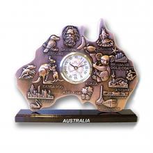 Metal Australia-shaped clock with various Australiana icons and locations embossed